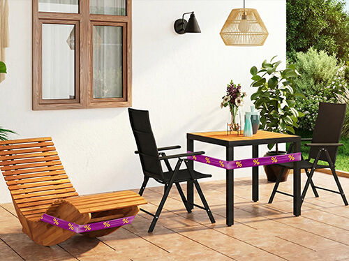 Wooden rocking sun lounger, and a black table with 2 chairs on a terrace, wrapped in purple-yellow discount ribbon. Click to see the products in the offer.