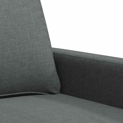 Close-up tiled fabric texture on gray upholstery.