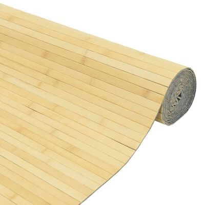 Rolled bamboo mat partially rolled with vertical slats visible