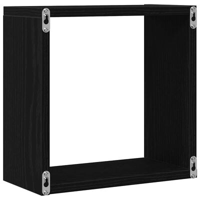 Corner view of a black cube shelf with metal brackets at joints