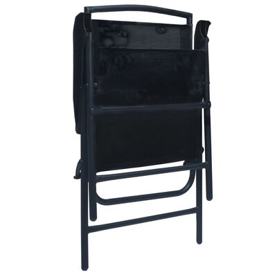 Back view of a folded black folding chair showing the folded frame.