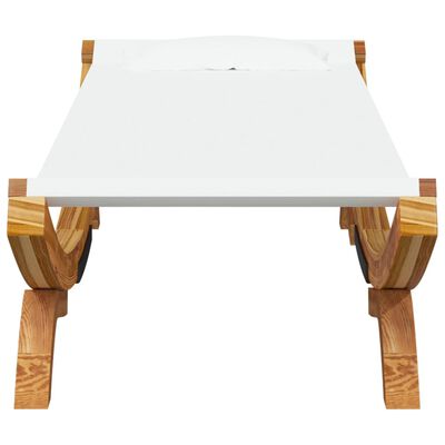 Front view of the lounge chair showing the white flat surface and wooden curved legs.
