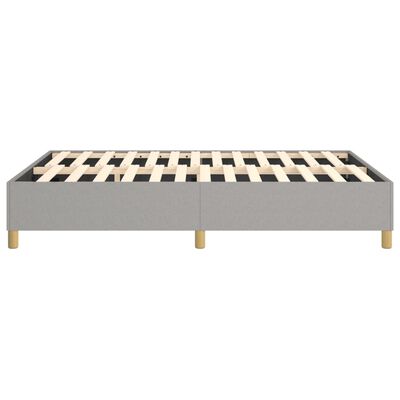 Grey platform bed frame with slatted bed base exposed, no mattress