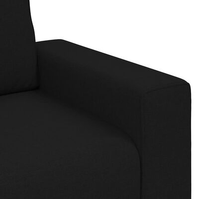Close-up of the sofa arm and seam texture in black fabric.
