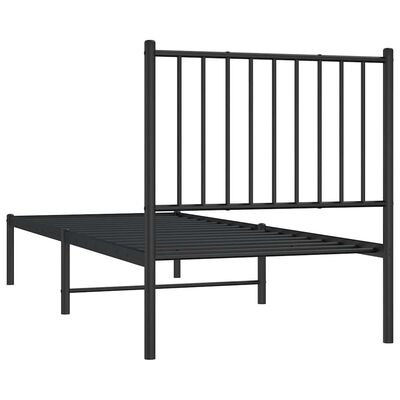 Three-quarter view of a black metal bed frame with vertical bars headboard and slatted base.
