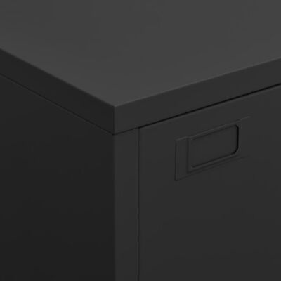 Close-up of top edge and handle recess on cabinet drawer.
