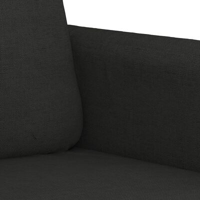 Close-up of corner of dark gray seating fabric on sofa