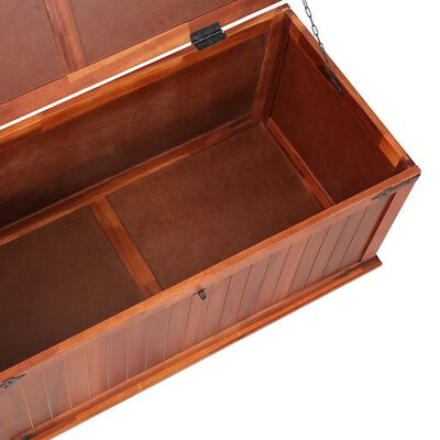 Interior of wood chest showing bottom panel and inner lining.
