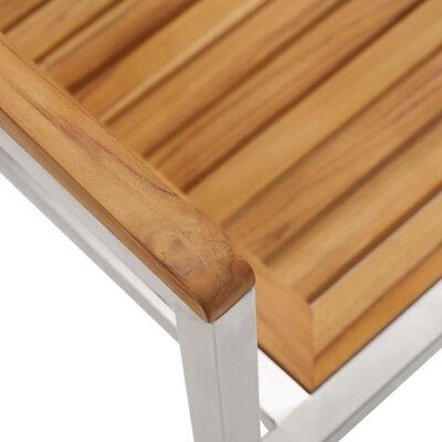 Close-up of wooden arm and top rail
