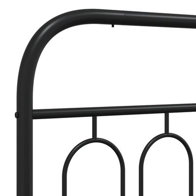 Close-up of curved corner joint on black metal bed frame showing rounded tube and connecting bar
