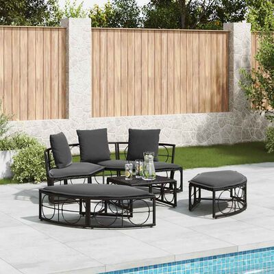 Outdoor circular sofa set with sofa and matching round ottoman and coffee table on patio