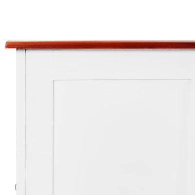 Close-up of the top corner and molding of the white storage bench.