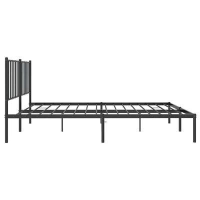 Side view of metal bed frame with headboard and long platform.