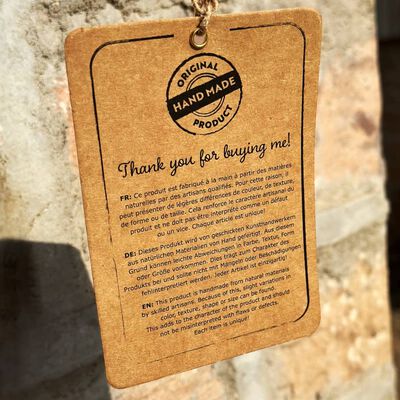 tag attached to a handmade product with text and seal