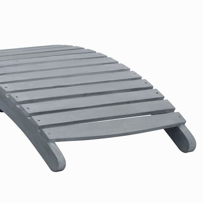 Partial view of grey slatted lounge chair with curved legs