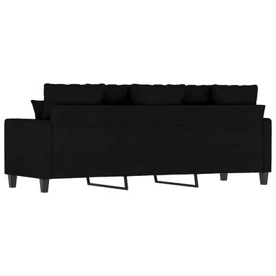 Close-up of a black sofa cushion and seam