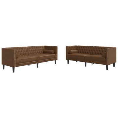 Two brown tufted sofas with nailhead trim and black legs facing each other, part of a modular sectional set.
