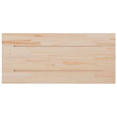 Back of wooden plank with knotty surface and light finish