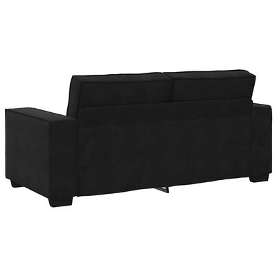 Back view of a black modular sofa with armrest on left side