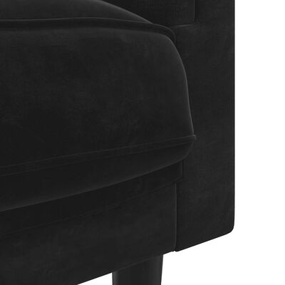 Close-up of the black sofa arm and upholstery texture.