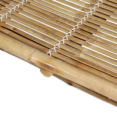 Close-up of woven bamboo slats and white cords.