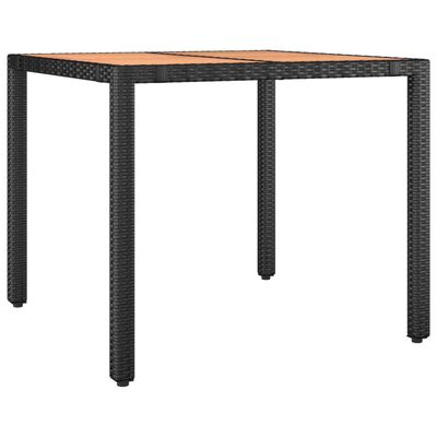 Wicker table with a wooden slatted top and four legs
