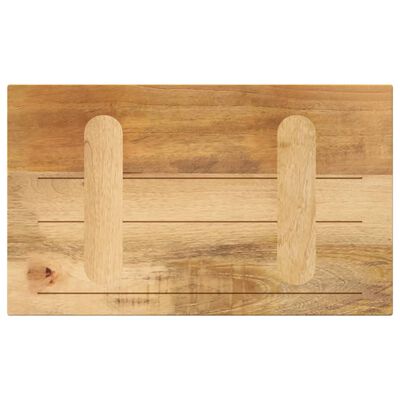 Wooden cutting board with two vertical handles carved into the board