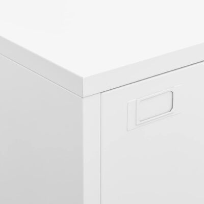Close-up of top corner and handle on white cabinet