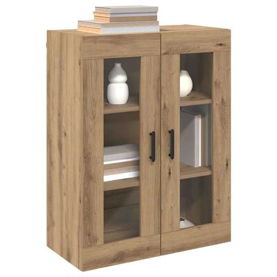 Wooden cabinet with two glass doors showing shelves and books inside