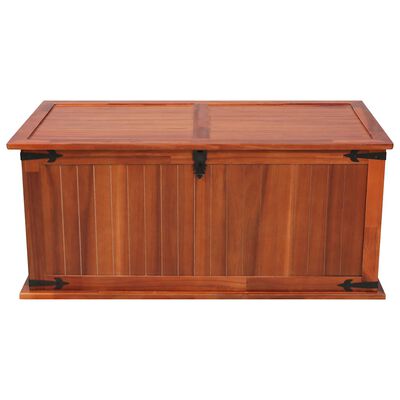 Wood storage chest with lid closed, front view showing panel details and metal hardware.