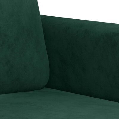 Close-up of teal green fabric upholstery on sofa armrest and seam