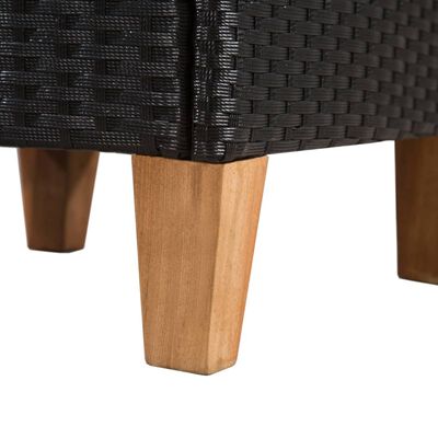 Close-up of the chair leg showing light wood finish and tapered leg.