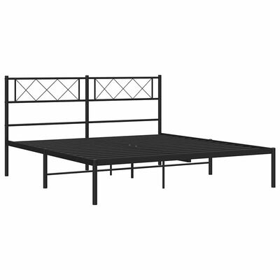 Low angle view of a metal bed frame with headboard and platform base