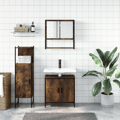 Rustic brown bathroom furniture set including wall cabinet, tall storage tower, vanity with sink, and plant in background