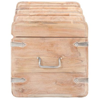 Front view of multiple wooden trunks stacked in a set, rounded edges and metal hardware.