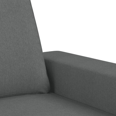 Close-up of the sofa arm and seam showing gray fabric upholstery