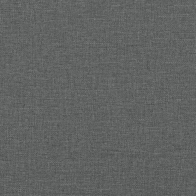 Fabric texture close-up showing the weave of the dark gray sofa upholstery.