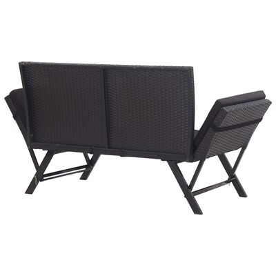 Rear view of dark wicker sofa with armrests folded out, metal frame base visible