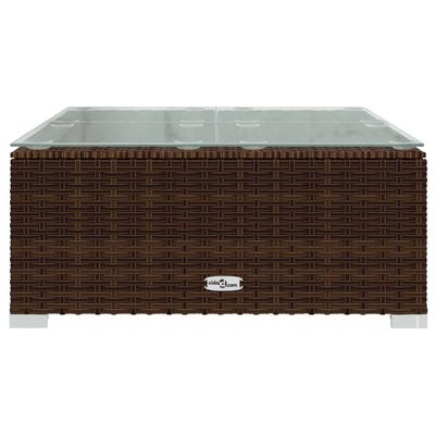 Brown wicker coffee table with glass top, front view.