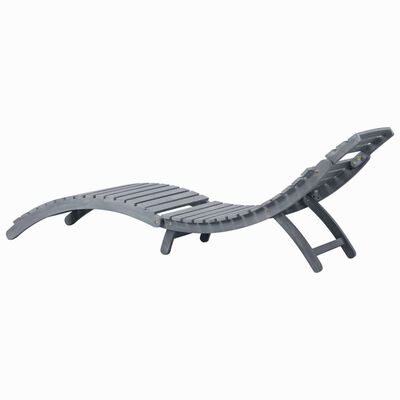 Grey curved lounge chair with wooden slats and frame