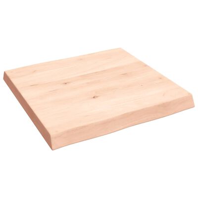 Wooden cutting board with beveled edge