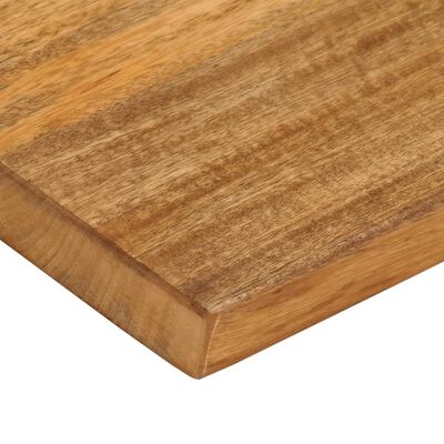 Close-up of wooden edge showing beveled corner of a cutting board or plank.
