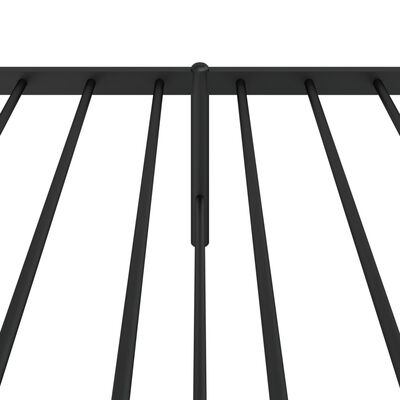 Close-up of metal bed frame slats and joint connection