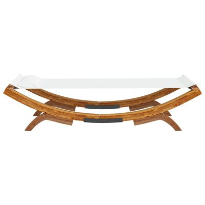 Side view of the curved lounge chair with wooden arches and a white surface.