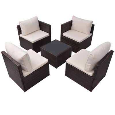 Top-down view of a corner seating arrangement in brown wicker with beige cushions and a central glass-topped table