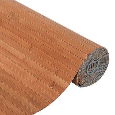 Rolled bamboo mat partially unrolled showing slats.