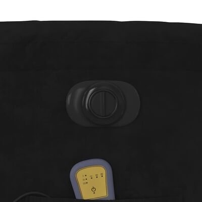 Close-up of circular knob and control panel area on chair