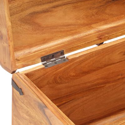 Close-up of metal hinge attached to wooden chest