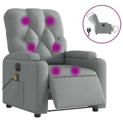 Gray recliner chair with massage points highlighted in pink and a remote control insert, showing built-in massage features