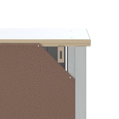 Close-up corner of a white cabinet with hinge and top trim.